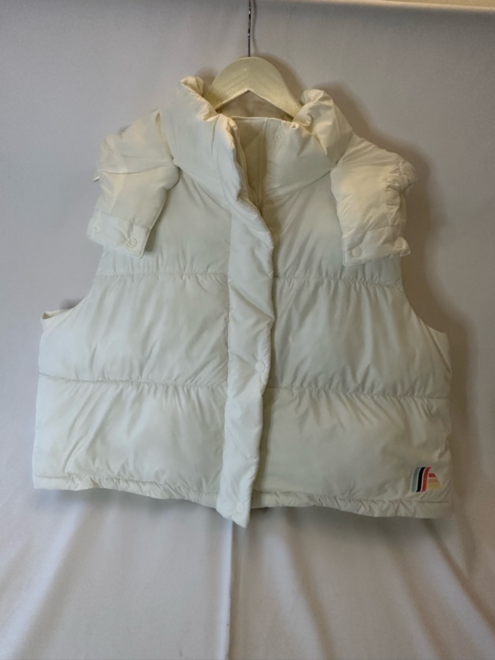 Cream Puffer Vest with Rainbow Accent